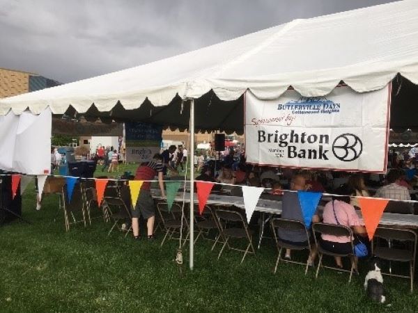 Tent with people gathered at the 2019 Butlerville Days Celebration